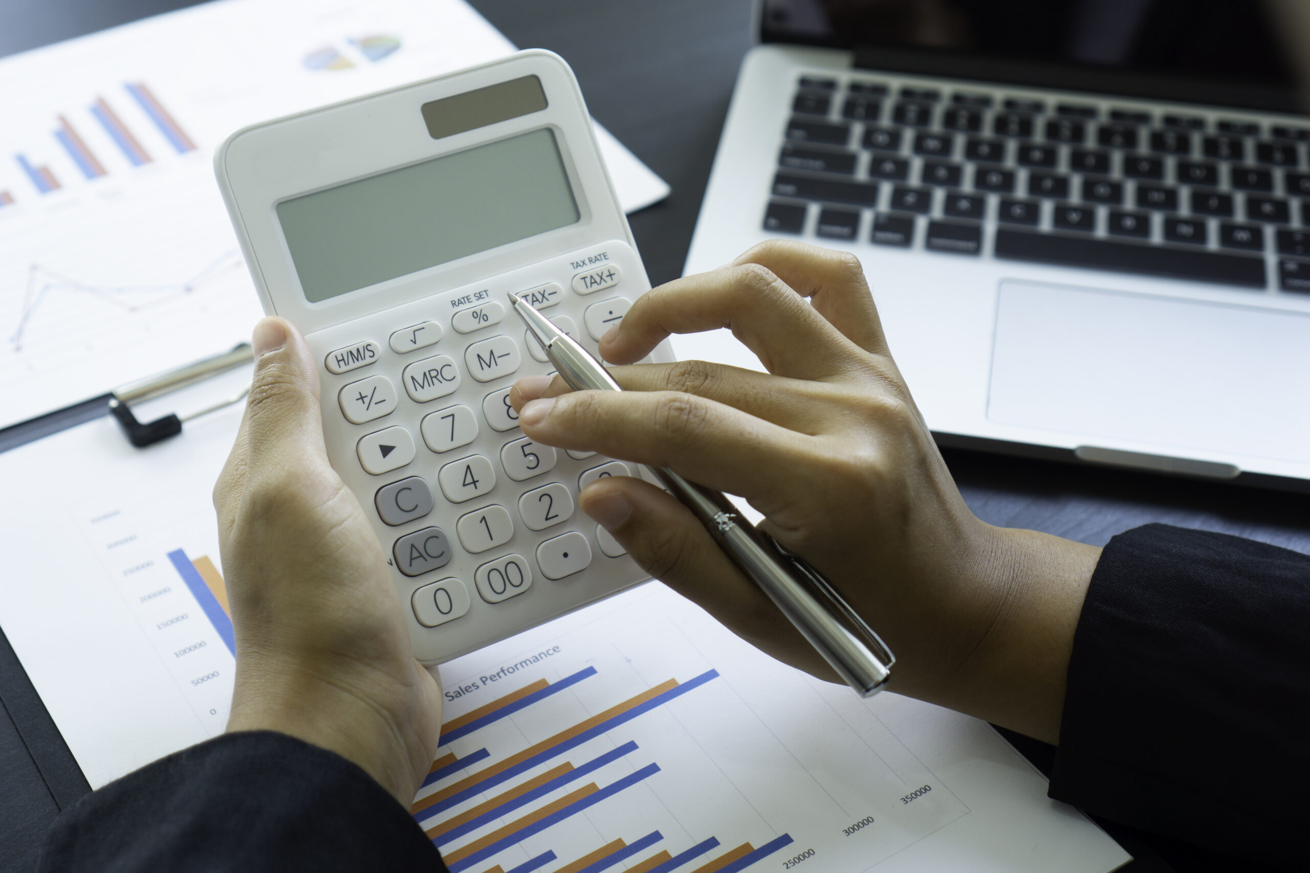 female asian finance workers are calculating the c 2025 02 19 17 41 26 utc scaled